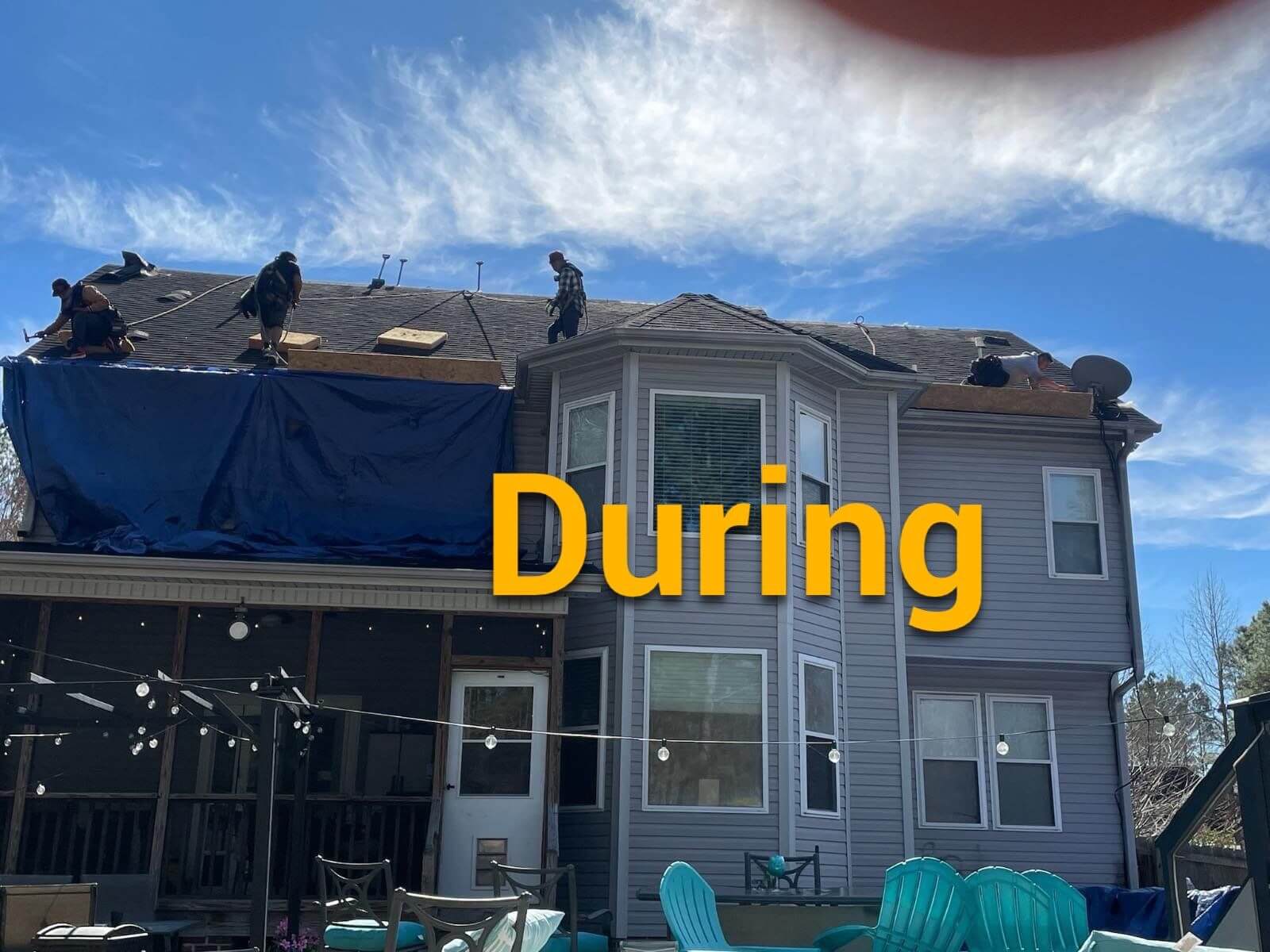 image shows RooflineXperts crew during roof installation in Raleigh NC